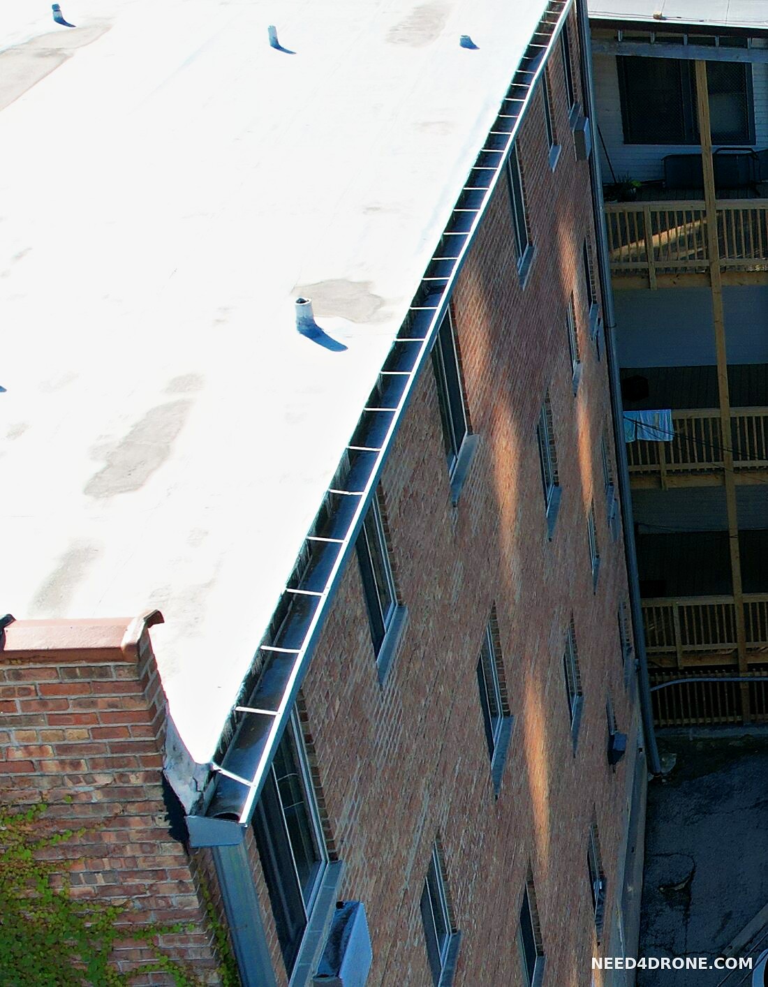Gutter turning into a downspout at the building corner